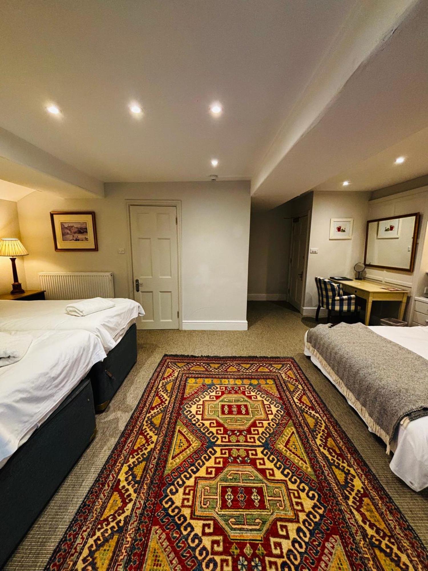 วินด์เซอร์ เกสต์เฮาส์ บาธ ภายนอก รูปภาพ A room at the hotel
